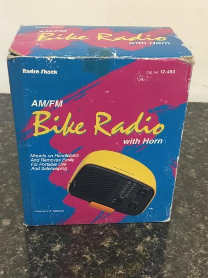 AM/PM Bike Radio with Horn Radio Shaek Cat. No. 12-453 AM/FM Bike Radio with Horn Mounts on Handlebars And Removes Easily For Portable Use And Safekeeping C Batteries