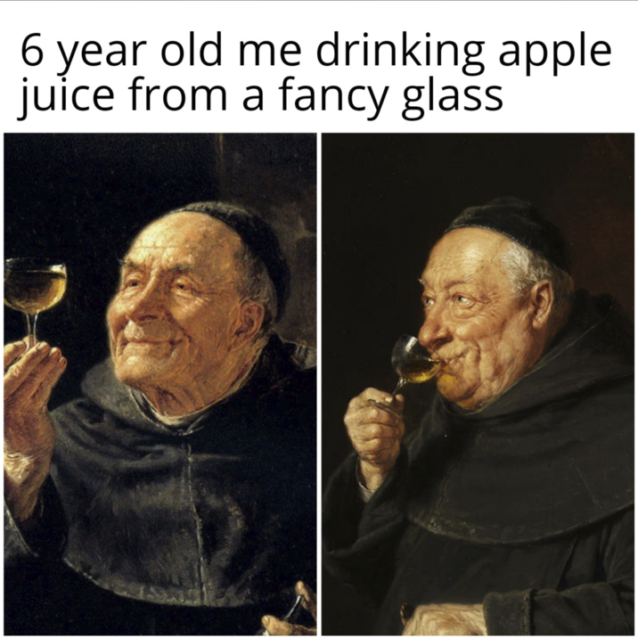 6 year old me drinking apple juice from a fancy glass.