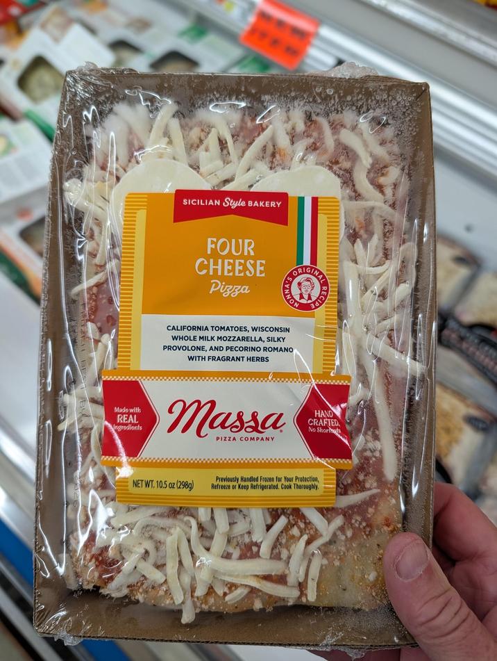 SICILIAN Style BAKERY FOUR CHEESE Pizza ORIGINAL NON CALIFORNIA TOMATOES, WISCONSIN WHOLE MILK MOZZARELLA, SILKY PROVOLONE, AND PECORINO ROMANO WITH FRAGRANT HERBS งดเว Made with REAL Ingredients Massa PIZZA COMPANY HAND CRAFTED No Shortsuts NET WT. 10.5 oz (298g) Previously Handled Frozen for Your Protection, Refreeze or Keep Refrigerated. Cook Thoroughly.