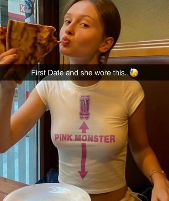 A meme reading "first date and she wore this." There is a photo of a woman wearing a "pink monster" shirt.