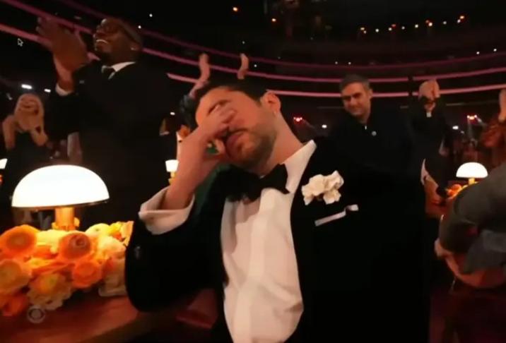 A reaction image of Bad Bunny crying. It is a meme from the Grammys 2026.