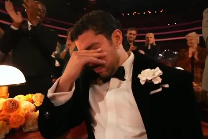 A reaction image of Bad Bunny crying. It is a meme from the Grammys 2026.