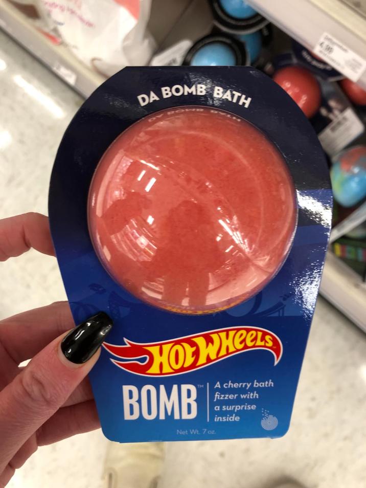 DA BOMB BATH " 4.99 Hot Wheels BOMB TM Net Wt. 7 oz. A cherry bath fizzer with a surprise inside