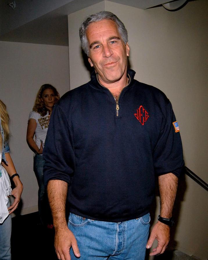 A photo of Jeffrey Epstein taken in 2005. He is wearing a custom quarter zip sweatshirt.