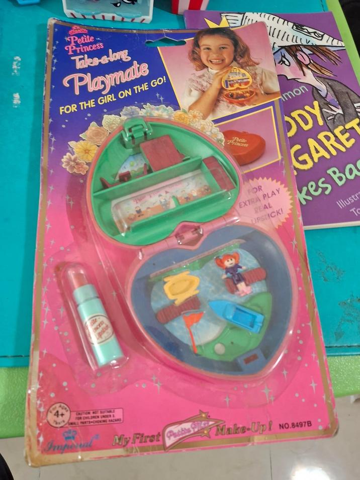 31 Petite Princess Takes-a-long Playmate FOR THE GIRL ON THE GO! ncess CAUTION NOT BUITABLE FOR CHILDREN UNDER 3. ALL PARTS-CHOKING HAZARD Imperial [ Princess FOR EXTRA PLAY REAL LIPSTICK! mon ODY GARE kes Ba Illustr My First P Make-Up! NO.8497B To