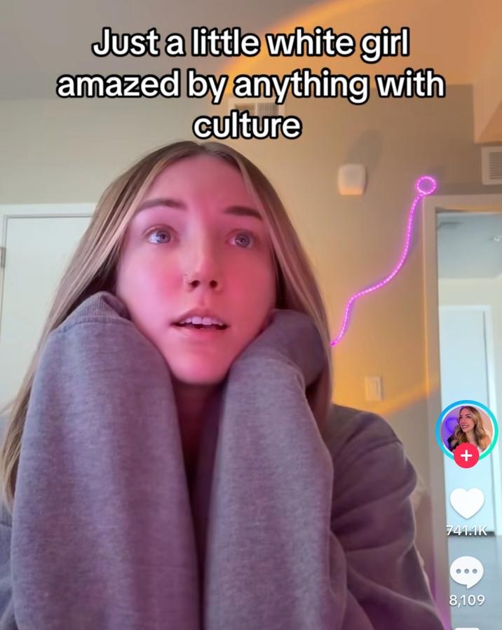 A reaction image based on a TikTok video by CategoryLori. It reads, "Just a little white girl amazed by anything with culture." 