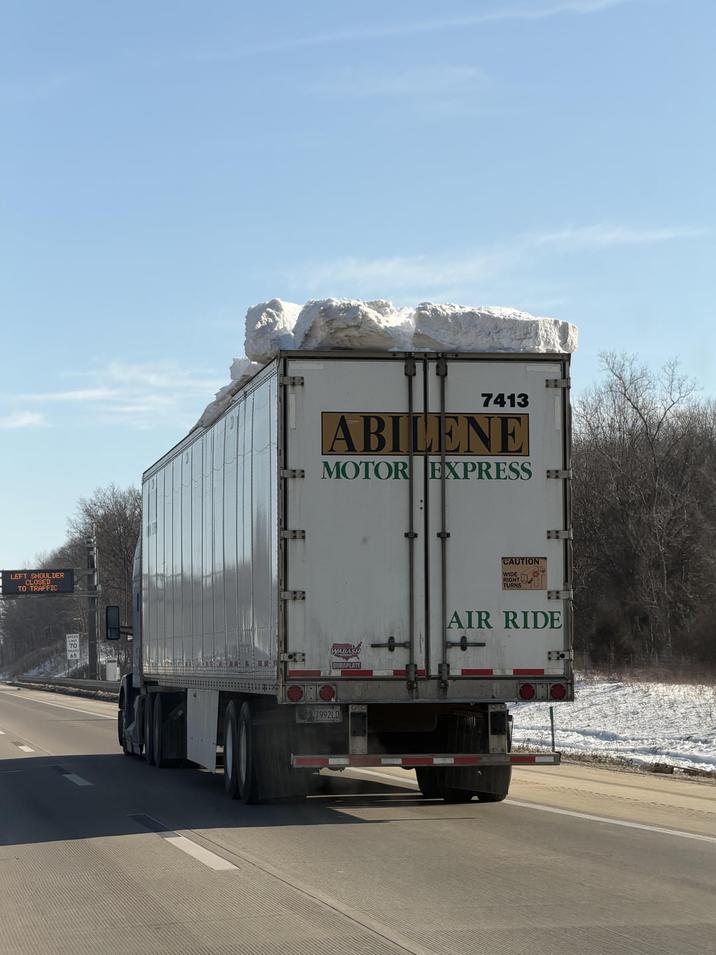 LEFT SHOULDER CLOSED TO TRAFFIC 7413 ABILENE MOTOR EXPRESS CAUTION WIDE RIGHT WABASH DURAPLATE AIR RIDE 7992LD