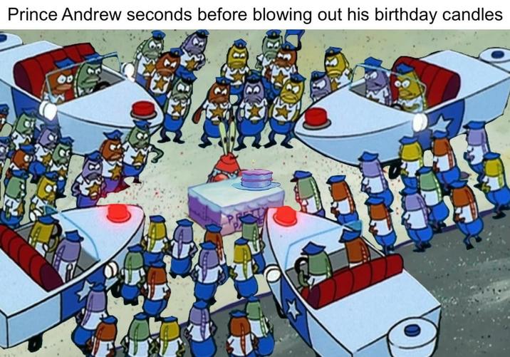 Prince Andrew seconds before blowing out his birthday candles