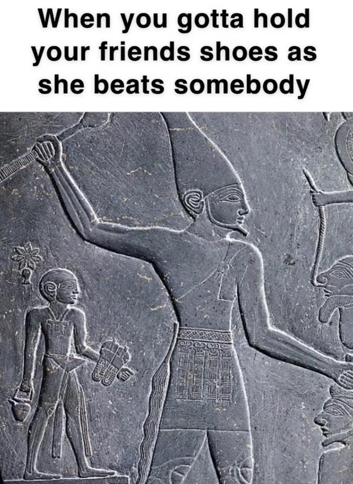 When you gotta hold your friends shoes as she beats somebody