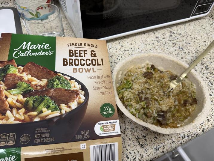Marie Callender's TENDER GINGER BEEF & BROCCOLI BOWL Tender Beef with Broccoli in a Savory Sauce over Rice 17g PROTEIN 13 720 Added Sedun Sugars SERVING SUGGESTION ENLARGED TO SHOW DETAIL KEEP FROZEN; COOK AS DIRECTED NET WT 11.8 OZ (335g) SERVING BOWL MADE FROM PLANT- BASED FIBER' ADE WITH HOMMES PLANT-BAGED FER arie Questions or comments, www.cariecallendersmeals.com or call 1-800-595-7010