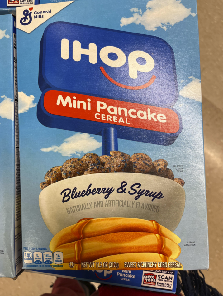 VING TION EARN CASH EDUCATION FOR SCHOOLS g General Mills Oil, Natural IHOP Mini Pancake CEREAL Vitamin Calc Tricalci Vitamin Vitamin Vitamin hydroch Vitamin AB Vita Vitamin B Contains CALORIES Blueberry & Syrup NATURALLY AND ARTIFICIALLY FLAVORED ENLARGED TO SHOW DETAIL PERCUP SERVING 140 0 SAT FAT 0% DV 180mg 12 SODIUM TOTAL 8% DV SUGARS NUTRITION FACTS FOR "AS PREPARED INFORMATION U NET WT 11.2 OZ (317) SWEET & CRUNCHY CORN CEREAL Mini Pancake CEREAL LOAD THE APP BOX SCAN TOPS EDUCATION YOUR RECEIPT EARN CASH FOR SCHOOLS SERVING SUGGESTION