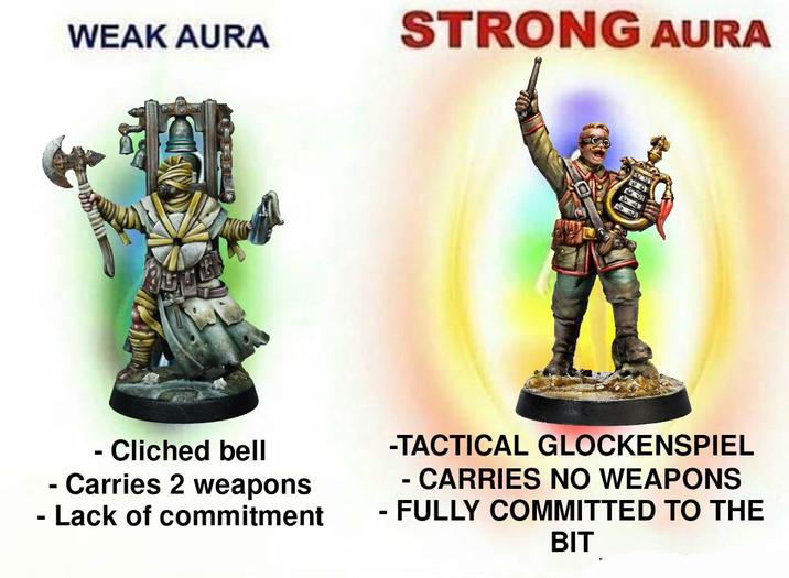 WEAK AURA STRONG AURA - Cliched bell - Carries 2 weapons - Lack of commitment -TACTICAL GLOCKENSPIEL - CARRIES NO WEAPONS - FULLY COMMITTED TO THE BIT
