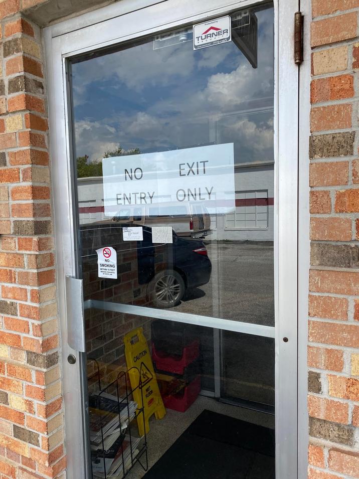 NO SMOKING WITHIN 15 FEET CAUTION WET FLOOR NO EXIT ENTRY ONLY go local Protected by TUVER