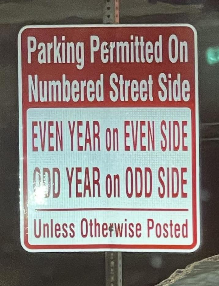 Parking Permitted On Numbered Street Side EVEN YEAR on EVEN SIDE COD YEAR on ODD SIDE Unless Otherwise Posted