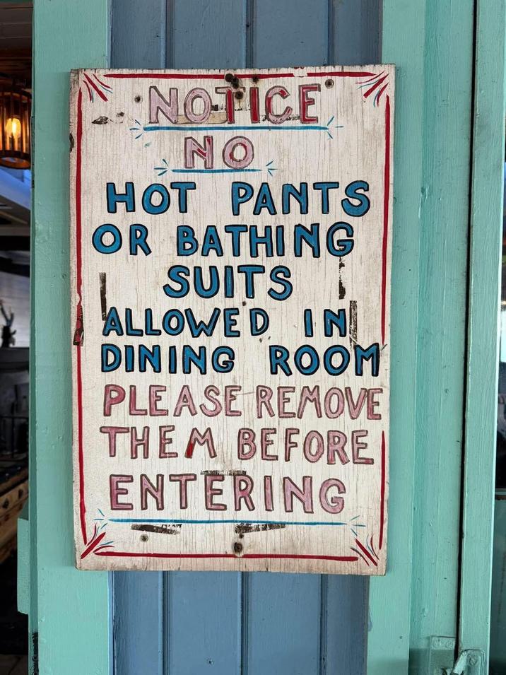 NOTICE NO HOT PANTS OR BATHING SUITS L ALLOWED IN DINING ROOM PLEASE REMOVE THEM BEFORE ENTERING