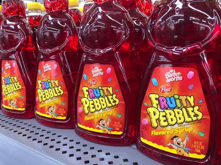 Batter worthis FRUITY EBBLES Flavored Syrup DMIR Post Bitter Worth's FRUITY PEBBLES Flavored Syrup 24 FL 02 POFLO Butter worth's Post FRUITY PEBBLES Flavored Syrup 24 FL OZ (1 PT 8 FL OZ) 710ml ESTION Mrs Butter worth's Post FRUITY PEBBLES NATURALLY AND ARTIFICIALLY FRUIT FLAVERED Flavored Syrup BRAND 24 FL OZ (1 PT 8 FL OZ) 710ml