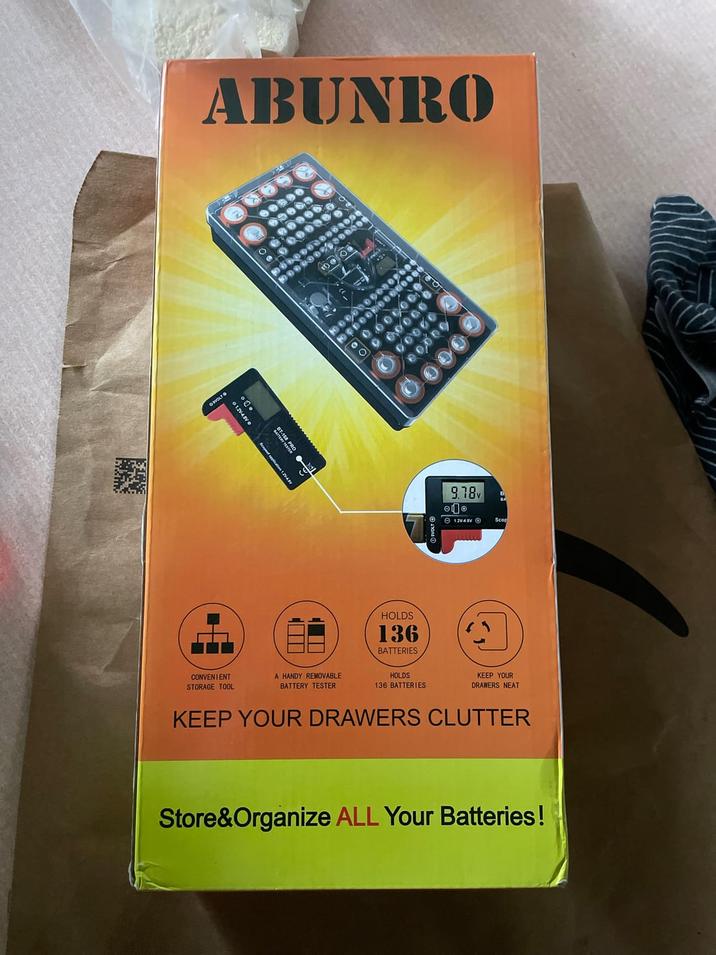 ABUNRO VOLTO BATTERY TESTER 10000 O HOLDS 136 BATTERIES HOLDS 9.18v 1.24 Scop CONVENIENT STORAGE TOOL A HANDY REMOVABLE BATTERY TESTER 136 BATTERIES KEEP YOUR DRAWERS NEAT KEEP YOUR DRAWERS CLUTTER Store&Organize ALL Your Batteries!