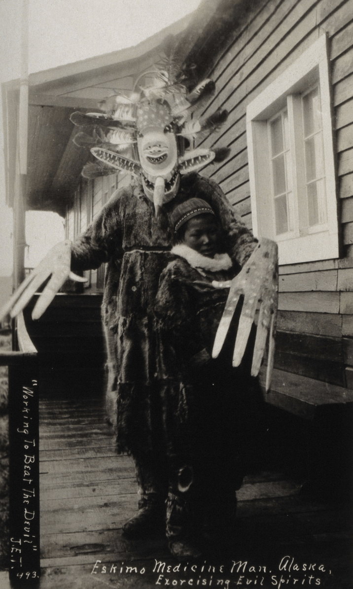 493. Eskimo Medicine Man. Alaska, Exorcising Evil Spirits. "Working To Beat The Devil" J.E.T