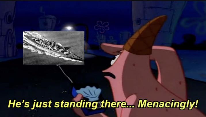 C He's just standing there... Menacingly!