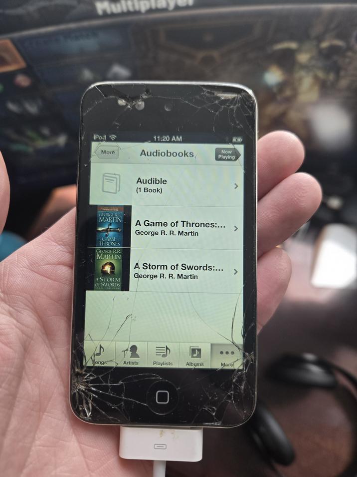 Mul iPod More 11:20 AM Audiobooks Audible (1 Book) Now Playing GAME & THRONES NEW AL SERIES FROW ADD GEORGE R.R. MARTIN GAME THRONES GEORGE R.R. MARTIN ASTORM OF SWORDS STEEL AND SNOW A Game of Thrones:... George R. R. Martin A Storm of Swords:... George R. R. Martin 7 > > 而 ongs Artists Playlists Albums More 3