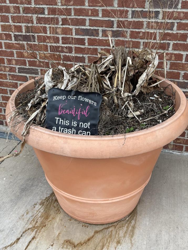 Keep our flowers beautiful This is not a trash can