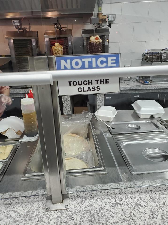 NOTICE TOUCH THE GLASS