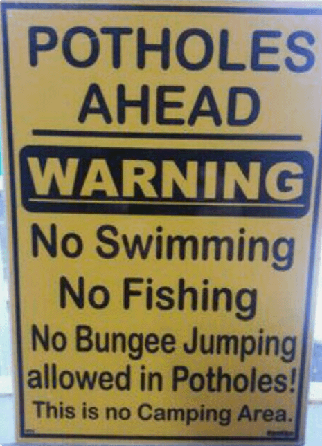 POTHOLES AHEAD WARNING No Swimming No Fishing No Bungee Jumping allowed in Potholes! This is no Camping Area.