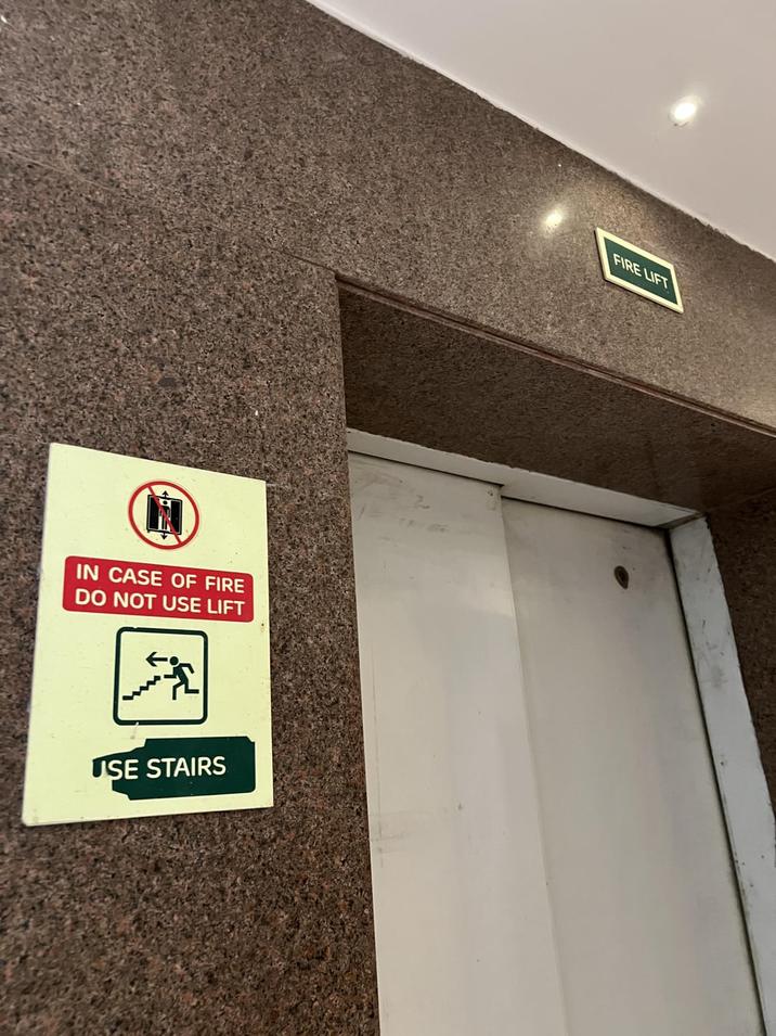 IN CASE OF FIRE DO NOT USE LIFT USE STAIRS FIRE LIFT