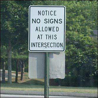 NOTICE NO SIGNS ALLOWED AT THIS INTERSECTION