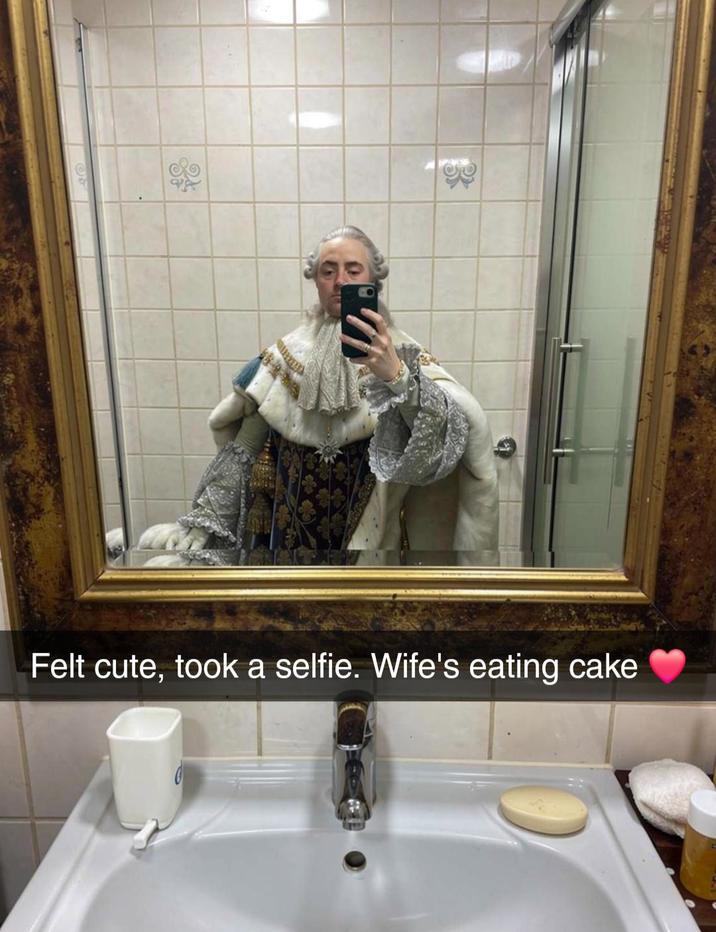 Felt cute, took a selfie. Wife's eating cake