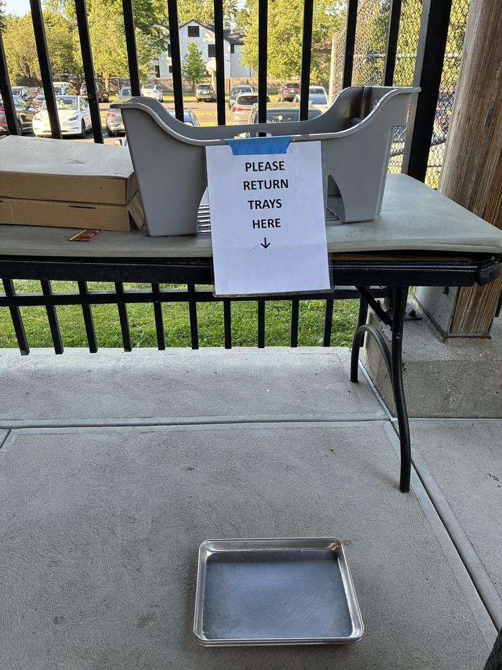 PLEASE RETURN TRAYS HERE