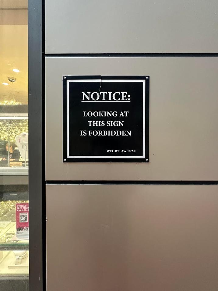 INTEREST FREE TERM AVAILABLE NOTICE: LOOKING AT THIS SIGN IS FORBIDDEN WCC BYLAW 10.2.2