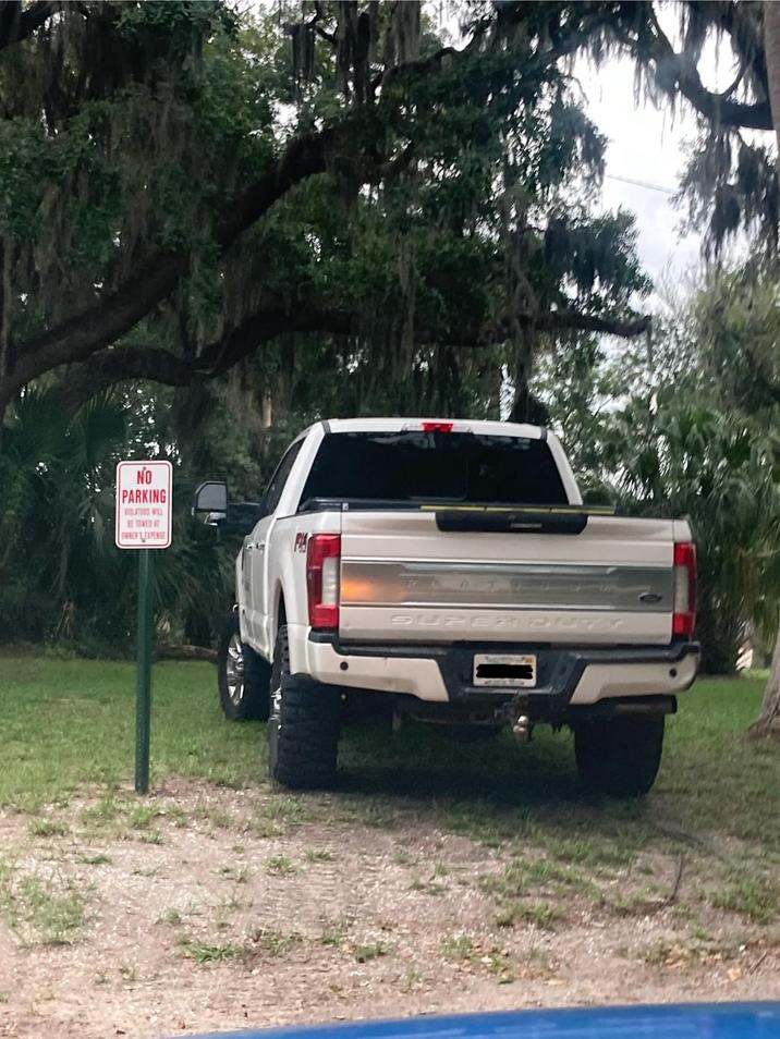 NO PARKING VIOLATORS WILL BE TOWED AT OWNER EXPENSE SUPER
