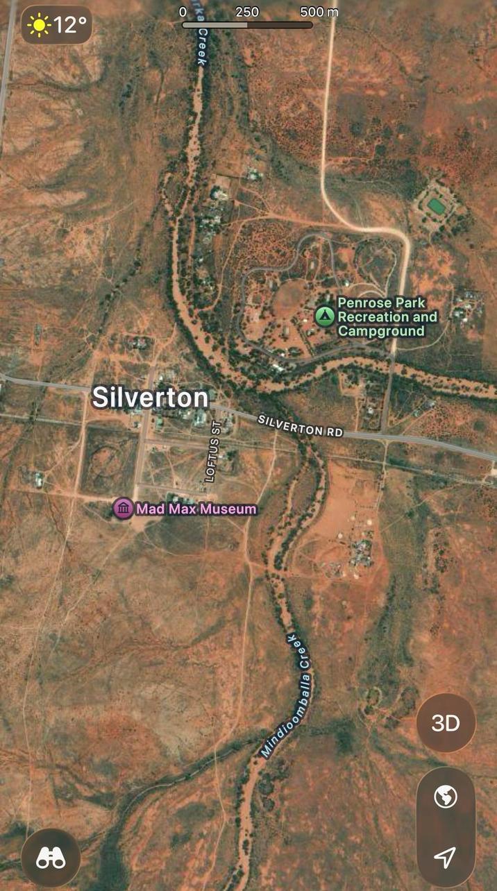 88 0 -12° Silverton LOFTUS ST ka Creek Mad Max Museum 250 500 m SILVERTON RD Mindioomballa Creek Penrose Park Recreation and Campground 3D จ