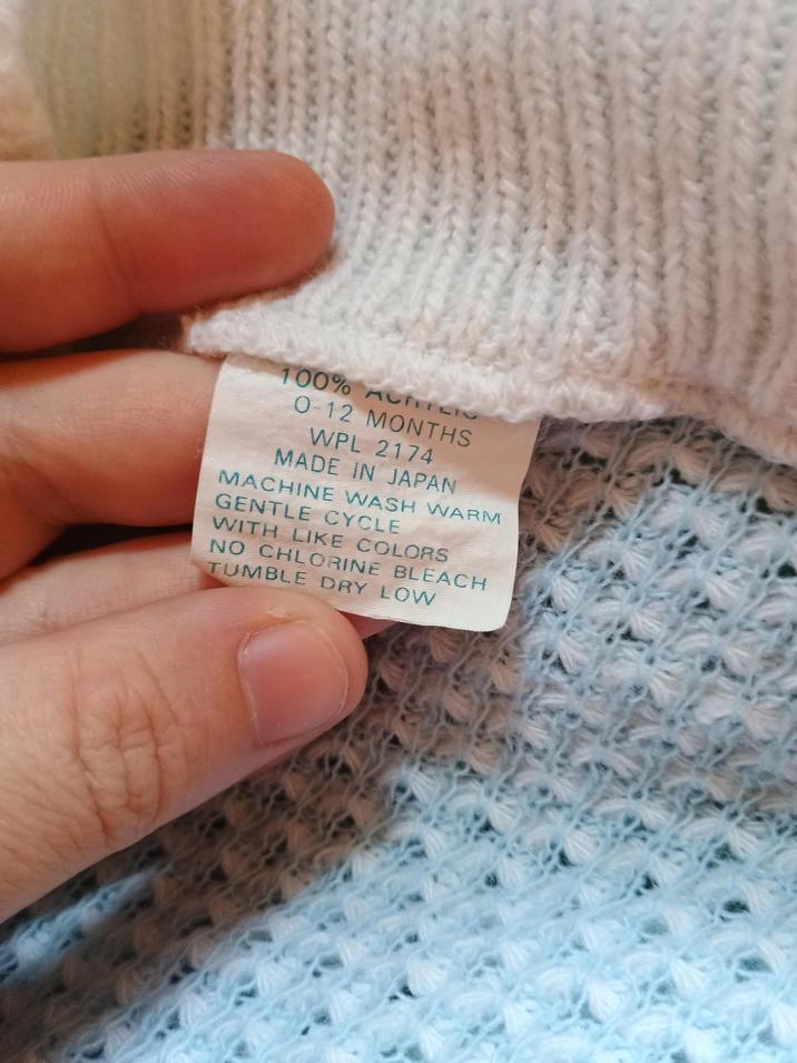 100% ACILIO 0-12 MONTHS WPL 2174 MADE IN JAPAN MACHINE WASH WARM GENTLE CYCLE WITH LIKE COLORS NO CHLORINE BLEACH TUMBLE DRY LOW