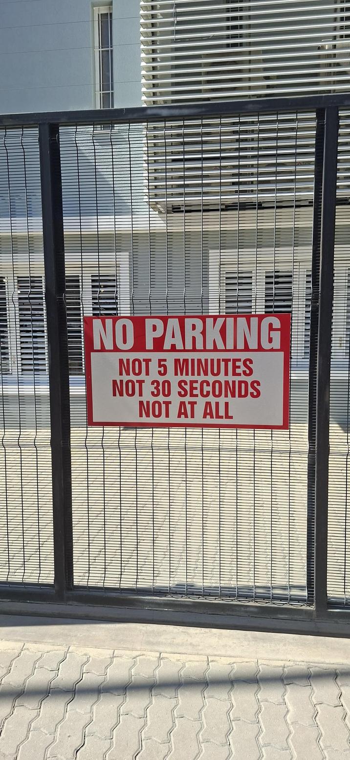 NO PARKING NOT 5 MINUTES NOT 30 SECONDS NOT AT ALL