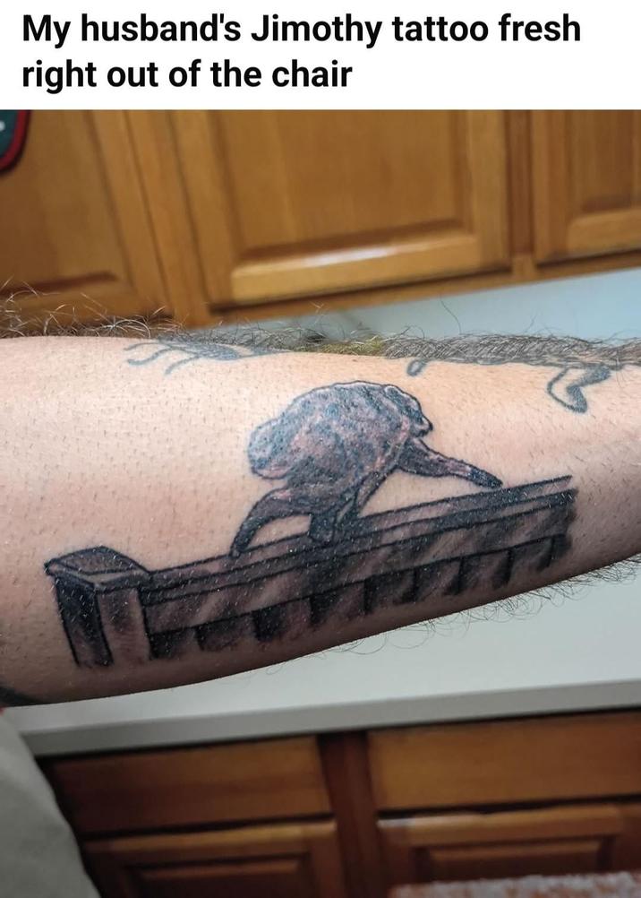 My husband's Jimothy tattoo fresh right out of the chair