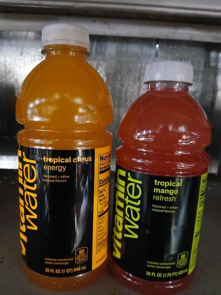 water NOV3026 22:21 tropical crus energy flavored + other natural flavors Nutriti About 25 Serviny Calories Total Far Sodin Total Card water Mal tropical mango refresh flavored + other natural flavors nutrient enhanced le water beverage 60 32 FL OZ (1 QT) 946 mL 60 nutrient enhanced Y water beverage 28 FL OZ (1.75 PT) 828
