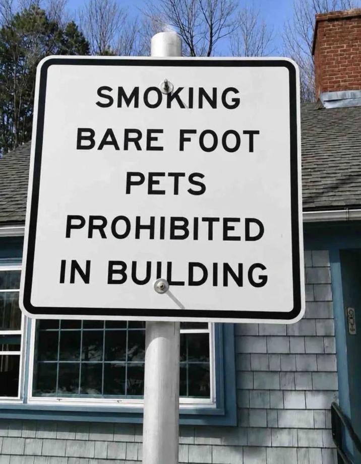 SMOKING BARE FOOT PETS PROHIBITED IN BUILDING 869