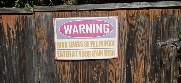 WARNING HIGH LEVELS OF PEE IN POOL ENTER AT YOUR OWN RISK