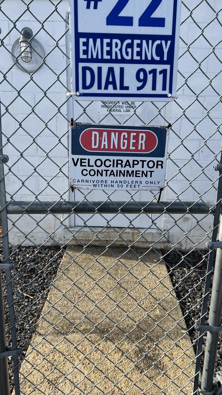 22 EMERGENCY DIAL 911 PROPERTY WIL BE PROSECUTED UNDER FADERAL LAW. DANGER VELOCIRAPTOR CONTAINMENT CARNIVORE HANDLERS ONLY WITHIN 50 FEET