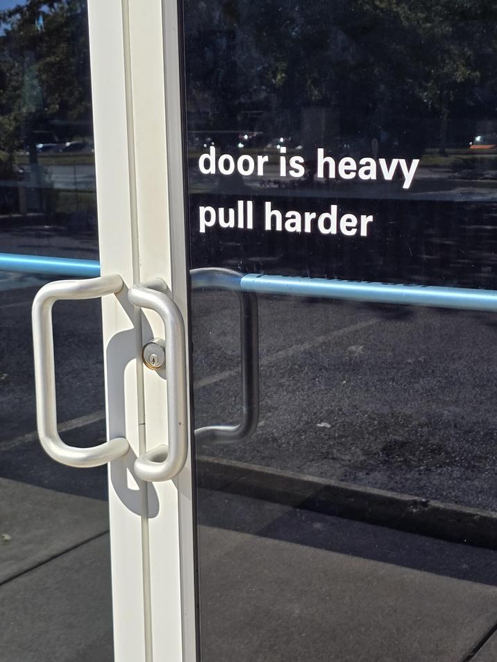 door is heavy pull harder