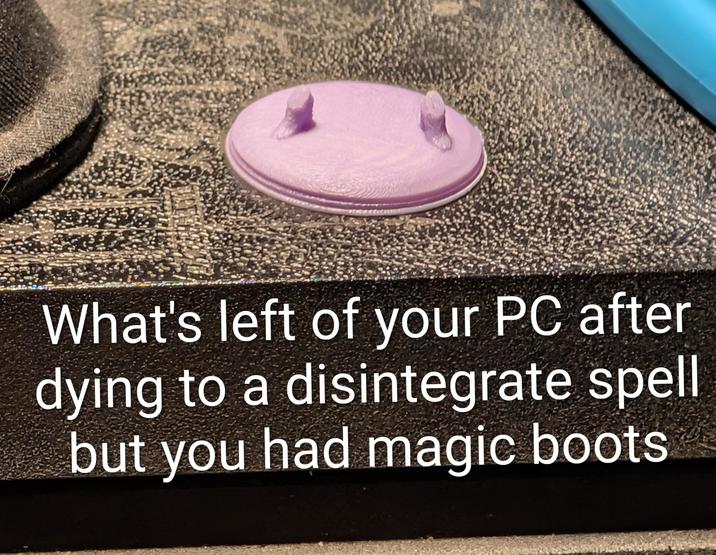 What's left of your PC after dying to a disintegrate spell but you had magic boots.