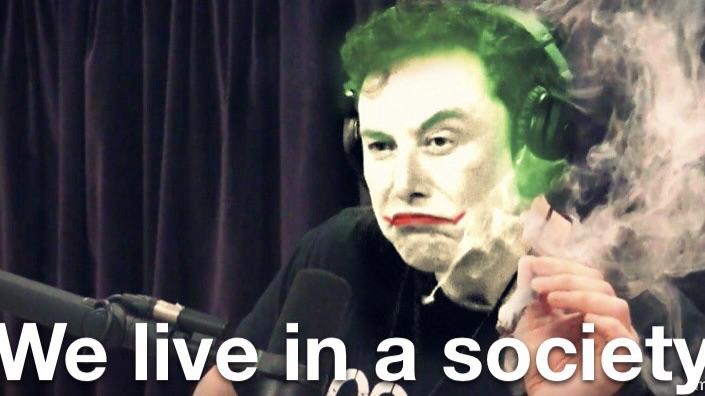 an edit of Elon Musk smoking weed but he's edited to look like the Joker and the text says 'we live in a society' and if you're not familiar with meme culture and you don't believe what this alt text is telling you is real then i envy you