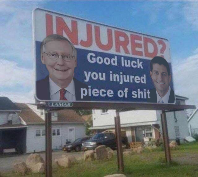 a billboard reading “injured? Good luck you injured piece of shit