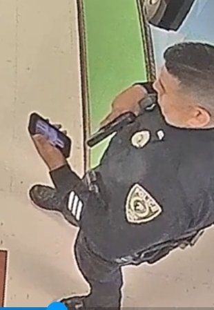 Uvalde Cop Staring at a Punisher Logo on His Phone