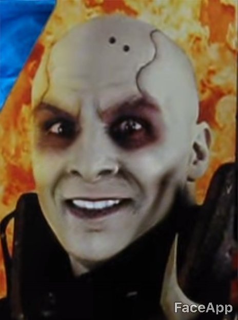 FaceApp smile edit of Quan Chi on a Mortal Kombat 4 arcade machine