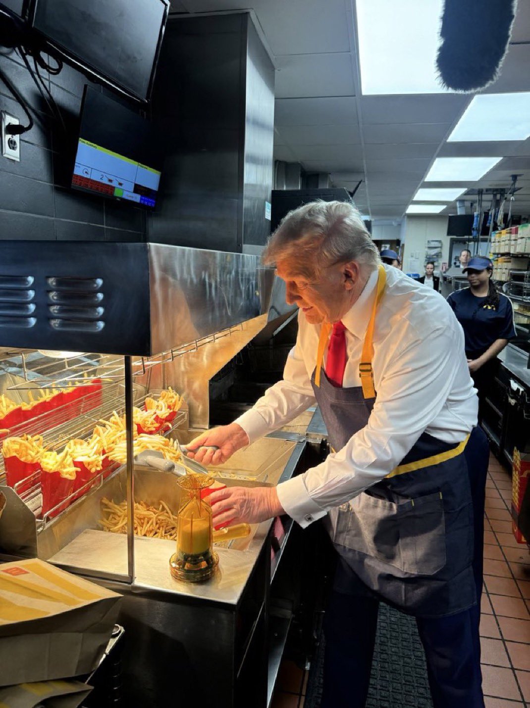 A photo of former U.S. President "Donald Trump":https://knowyourmeme.com/memes/people/donald-trump serving french fries at "McDonald's":https://knowyourmeme.com/memes/subcultures/mcdonalds taken during his October 2024 photo op at a Pennsylvania McDonald's. This photo of Trump working at McDonald's became a popular "reaction image":https://knowyourmeme.com/memes/reaction-images, "exploitable":https://knowyourmeme.com/memes/exploitables and "image macro":https://knowyourmeme.com/memes/image-macros in the following weeks. Many of the memes referenced the "catchphrase":https://knowyourmeme.com/memes/cultures/catchphrases "Just Put the Fries in the Bag":https://knowyourmeme.com/memes/just-put-my-fries-in-the-bag-bro. 