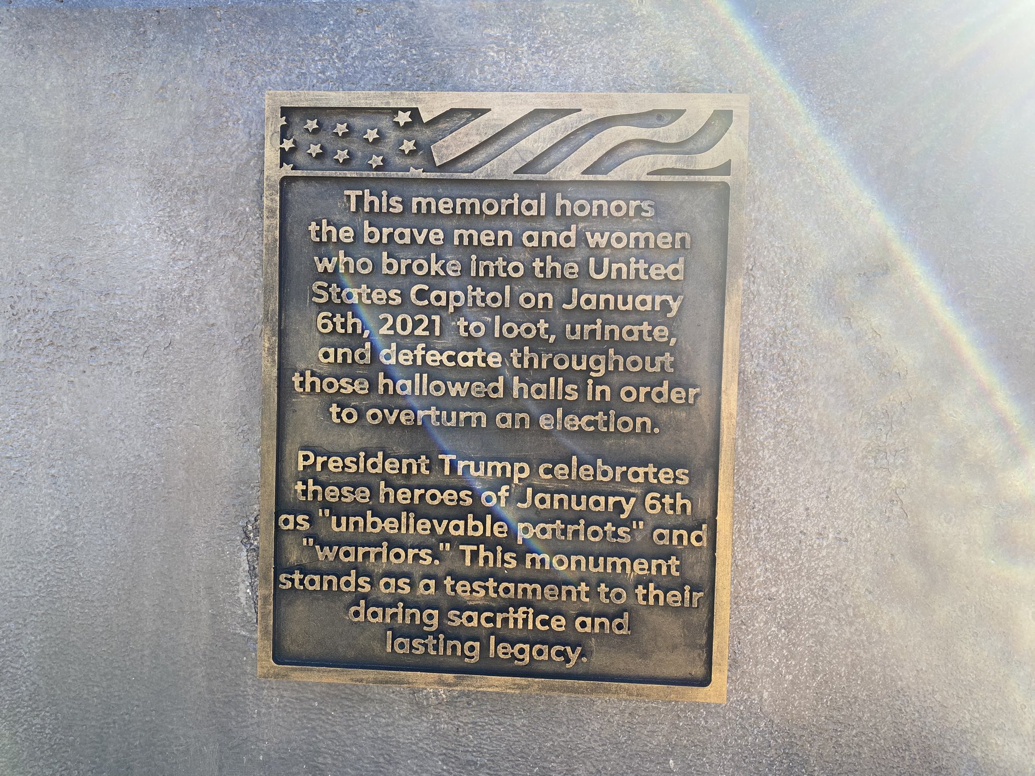 This memorial honors the brave men and women who broke into the United States Capitol on January 6th, 2021 to loot, urinate, and defecate throughout those hallowed halls in order to overturn an election. President Trump celebrates these heroes of January 6th as "unbelievable patriots" and "warriors." This monument stands as a testament to their daring sacrifice and lasting legacy.