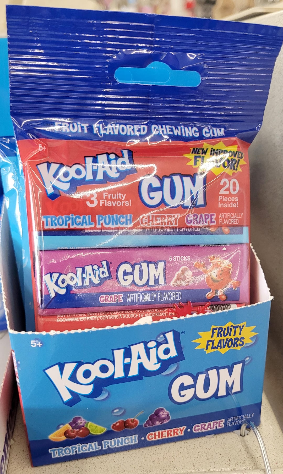 5+ FRUIT FLAVORED CHEWING GUM NEW IMPROVED FOR! Kool Aid GUM Fruity 3 Flavors! TROPICAL PUNCH CHERRY GRAPE ARTIGIALLI PLAVORED Kool Aid GUM SOY LECITHIN), 5 STICKS GRAPE ARTIFICIALLY FLAVORED PARTAME), COLORING (B-CAR GOSHINEAL EXTRACT CONTAINS A SOURCE OF ANTIOXIDANT BHI. 20 Pieces Inside! ARTIFICIALLY FLAVORED Kool-Aid ® FRUITY FLAVORS GUM ARTIFICIALLY TROPICAL PUNCH CHERRY GRAPE AVA